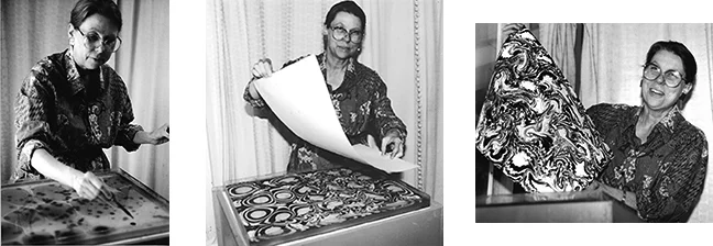Myrrh doing marbled paper, 1990, as part of her investigation of fluid flow patterns.