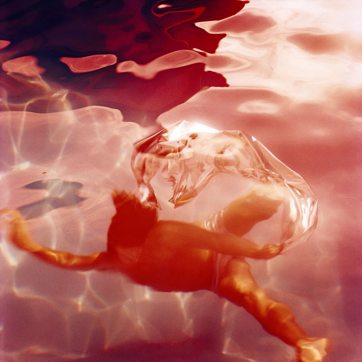 Untitled #1 (Flux) , 2012, 48x48" c-print
Normal
0
false
false
false
EN-US
JA
X-NONE
/* Style Definitions */
table.MsoNormalTable
{mso-style-name:"Table Normal";
mso-tstyle-rowband-size:0;
mso-tstyle-colband-size:0;
mso-style-noshow:yes;
mso-style-priority:99;
mso-style-parent:"";
mso-padding-alt:0in 5.4pt 0in 5.4pt;
mso-para-margin:0in;
mso-para-margin-bottom:.0001pt;
mso-pagination:widow-orphan;
font-size:10.0pt;
font-family:"Times New Roman";
mso-fareast-language:JA;}
Normal
0
false
false
false
EN-US
JA
X-NONE
/* Style Definitions */
table.MsoNormalTable
{mso-style-name:"Table Normal";
mso-tstyle-rowband-size:0;
mso-tstyle-colband-size:0;
mso-style-noshow:yes;
mso-style-priority:99;
mso-style-parent:"";
mso-padding-alt:0in 5.4pt 0in 5.4pt;
mso-para-margin:0in;
mso-para-margin-bottom:.0001pt;
mso-pagination:widow-orphan;
font-size:10.0pt;
font-family:"Times New Roman";
mso-fareast-language:JA;}
For a series of large-scale images of distorted human figures, the artist directed a professional dancer to perform underwater in a swimming pool, testing the body’s resistance in an unfamiliar element and under challenging conditions, thus evoking man’s struggle with nature and the uncertainty of the human experience. Performative aspects have long been part of Laval’s work, as evidenced in her Inferno video and Poolscapes series, as well her early Pool series, where spontaneous scenes of bathers appear to be composed by a silent choreographer once isolated within the frame of her camera. Together with another set of small and intimate photographs of split reflections that harken back to early 20th century avant-garde photography, these images of bodies caught in a transient state raise questions of essence and identity. 