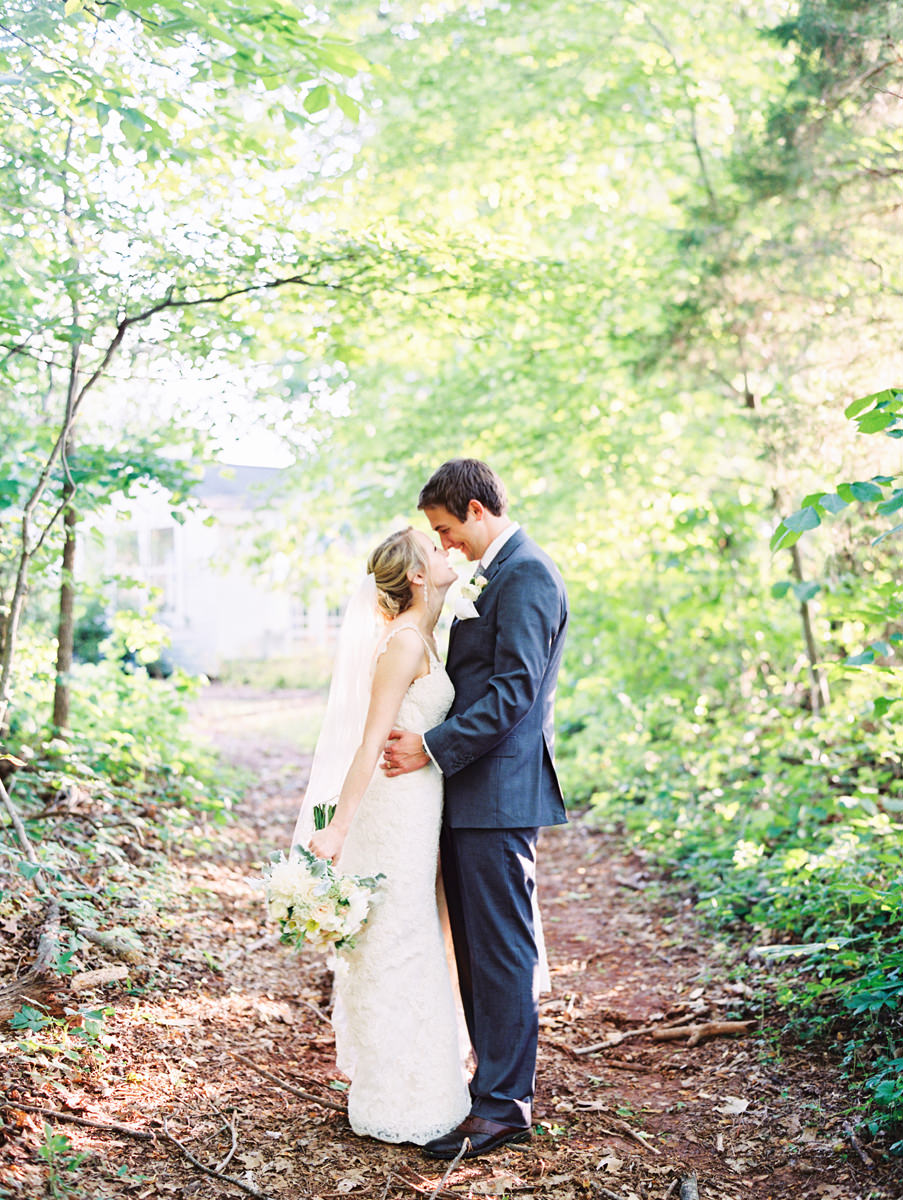 Bride and Groom in the Woods Laughing