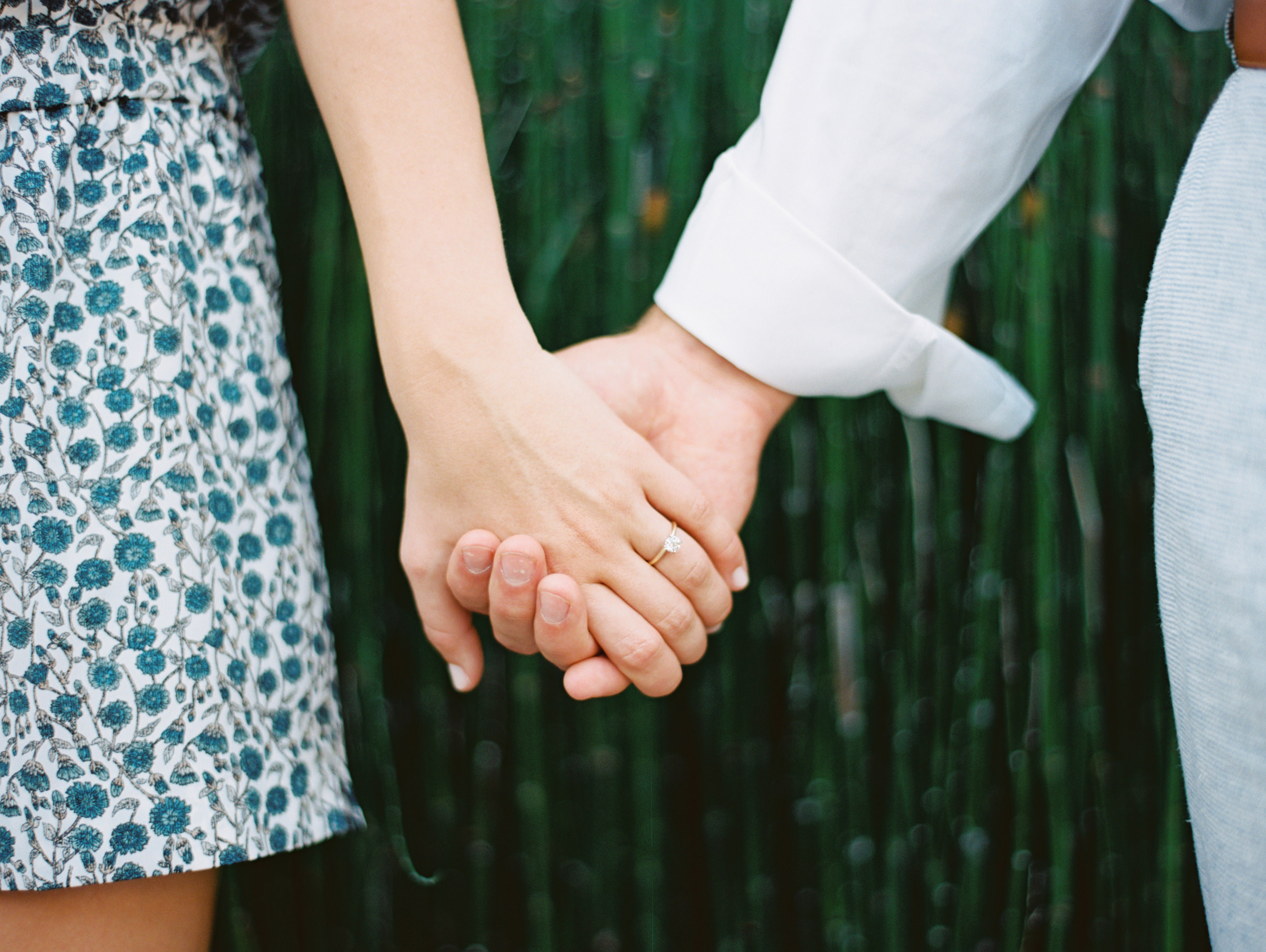 Downtown Charleston SC Engagement Session Holding Hands Ring Shot