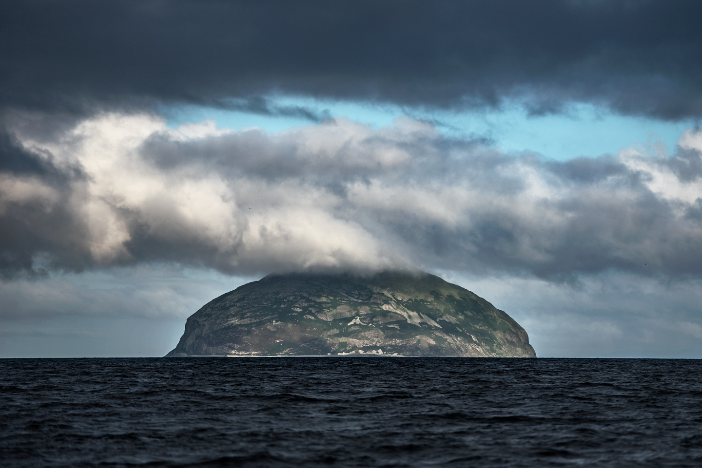  Ailsa Craig in the Firth of Clyde is another study site with 36 000 breeding pairs of gannets. This granite rock is formed from the volcanic plug of an extinct volcano 
