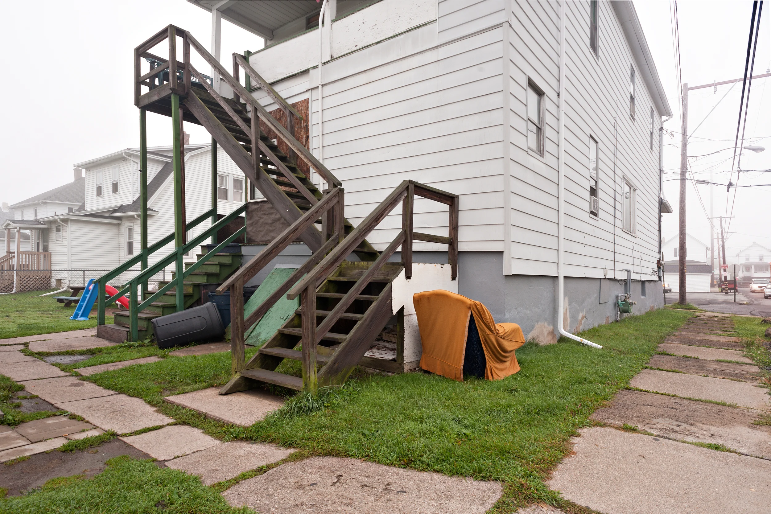 Foggy house with orangey chair.jpg