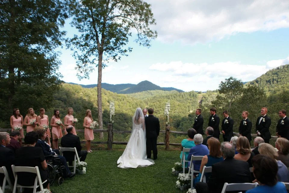 Asheville wedding photography at Castle Ladyhawke by Ryan Bumgarner. Outside spring ceremony photograph. 