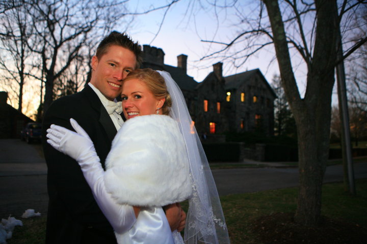 Bride and groom portrait photograph in the winter at the wedding venue, Homewood in Asheville, NC by Western NC wedding photographer, Ryan Bumgarner.