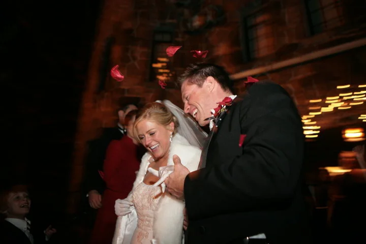 Bride and groom portrait photograph during the reception at the wedding venue, Homewood in Asheville, NC by Western NC wedding photographer, Ryan Bumgarner.