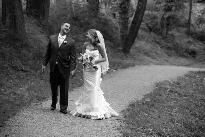 Black and white bride and groom portrait photograph in the winter at the wedding venue, Homewood in Asheville, NC by Western NC wedding photographer, Ryan Bumgarner.