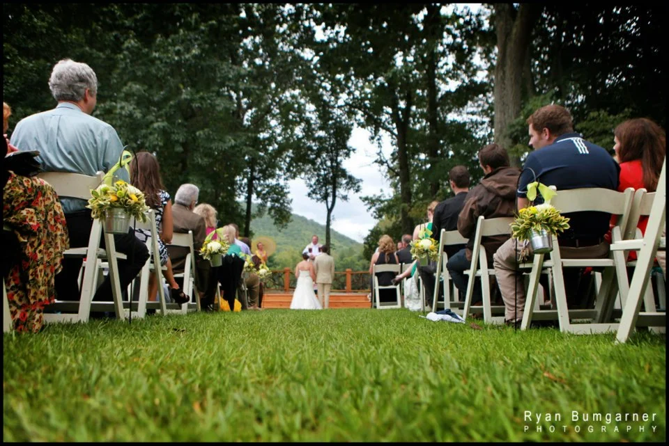 Ceremony wedding photographs at the wedding venue, Lake Eden in Asheville, NC by Western NC wedding photographer, Ryan Bumgarner.