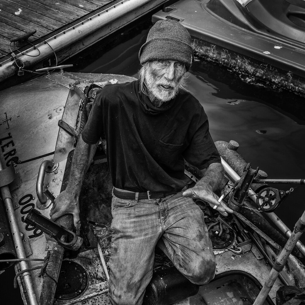 Fisherman In His Boat.jpg