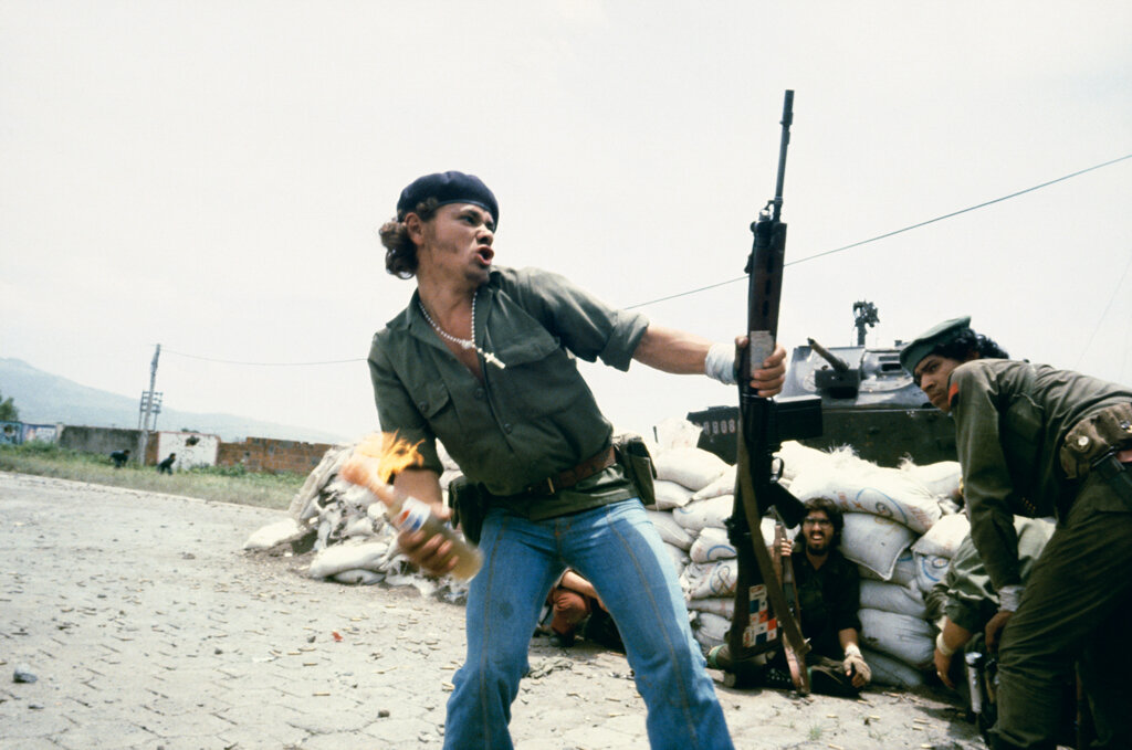 Sandinistas at the walls of the EstelÍ National  Guard headquarters: 'Molotov Man' Estel Í, Nicaragua, July 16th, 1979