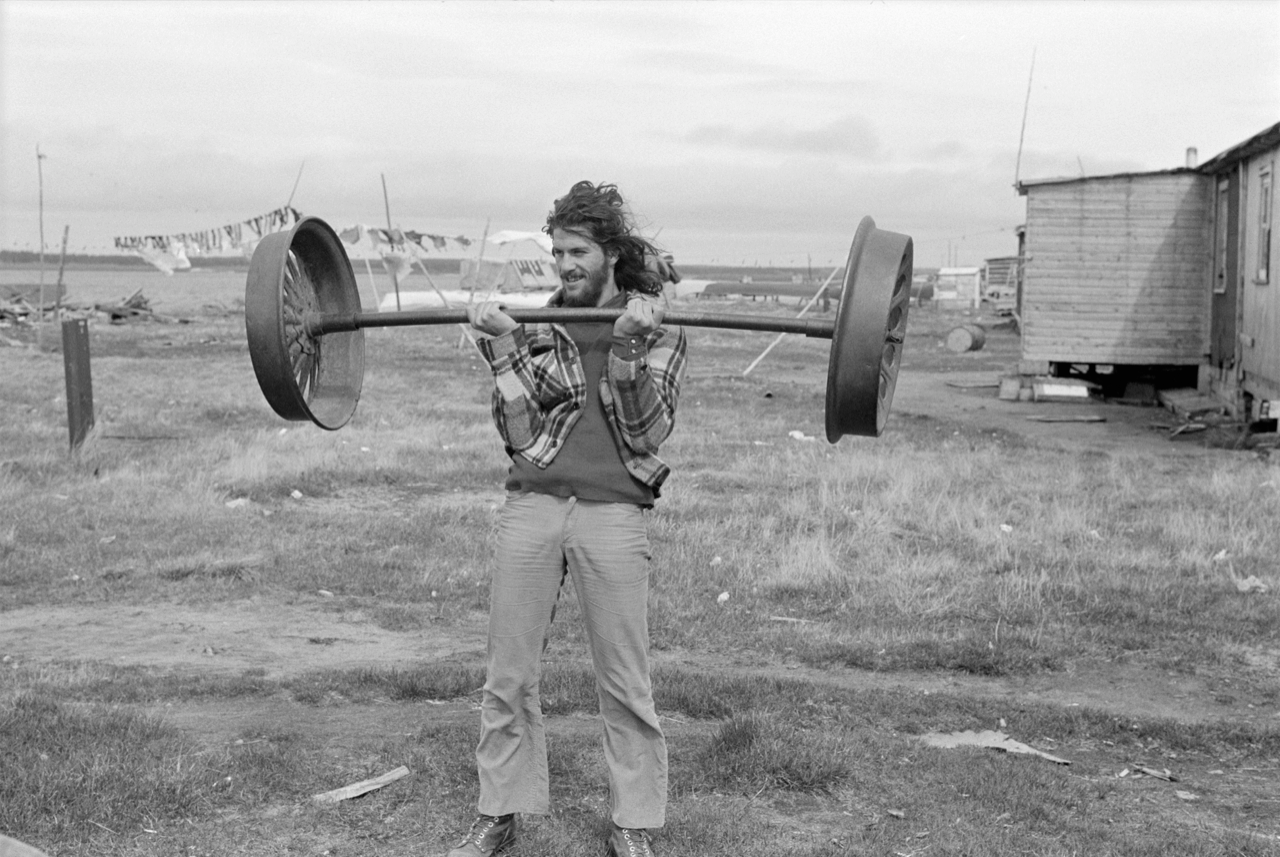 George lifting weights with the Cree, 1973