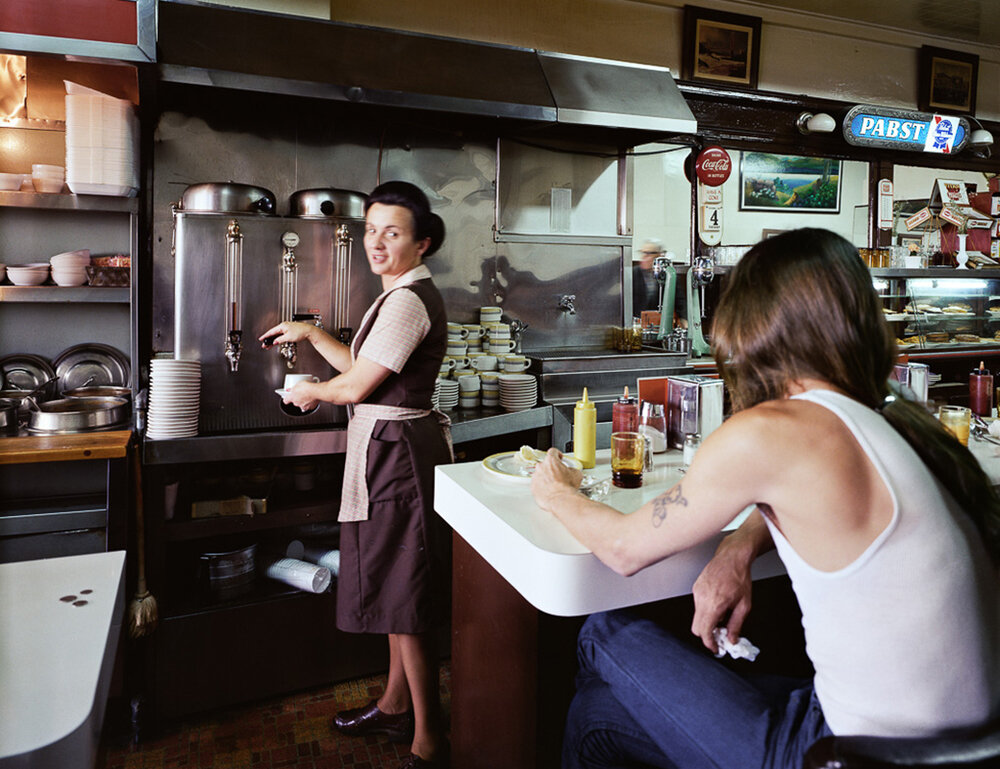 Janet Delaney Pat+serving+coffee+at+the+Gordon+Cafe,+7th+at+Mission+Street,+1980.jpg