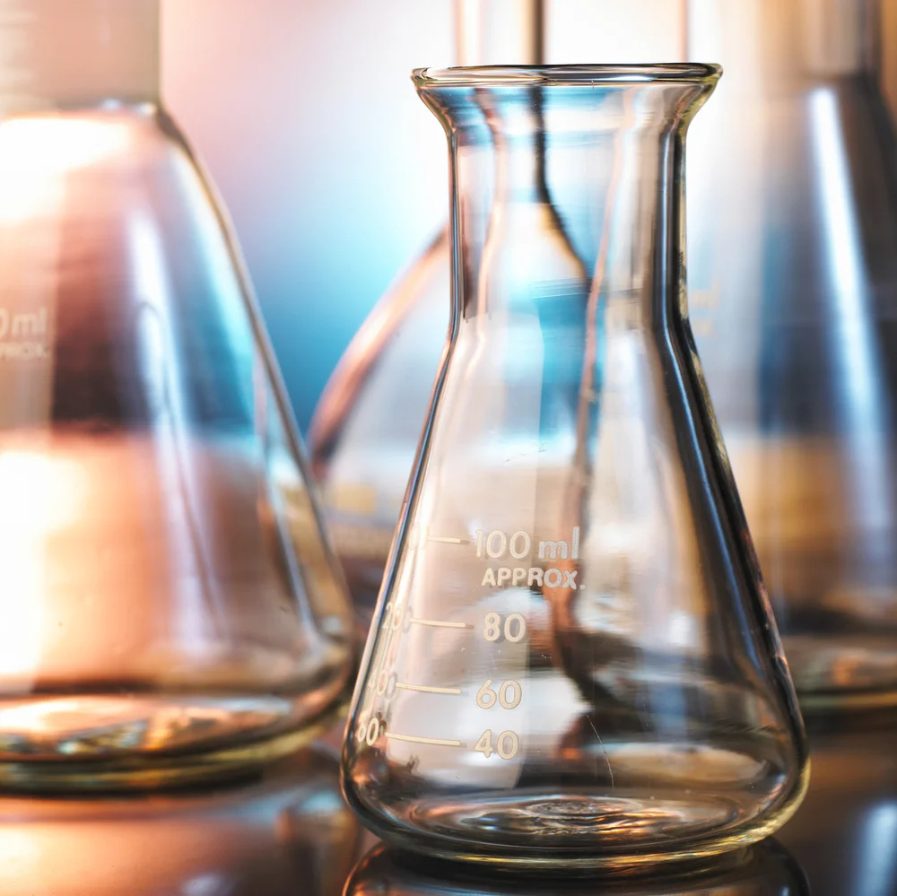 shutterstock_39160669 beaker flask science scientist westech.jpg