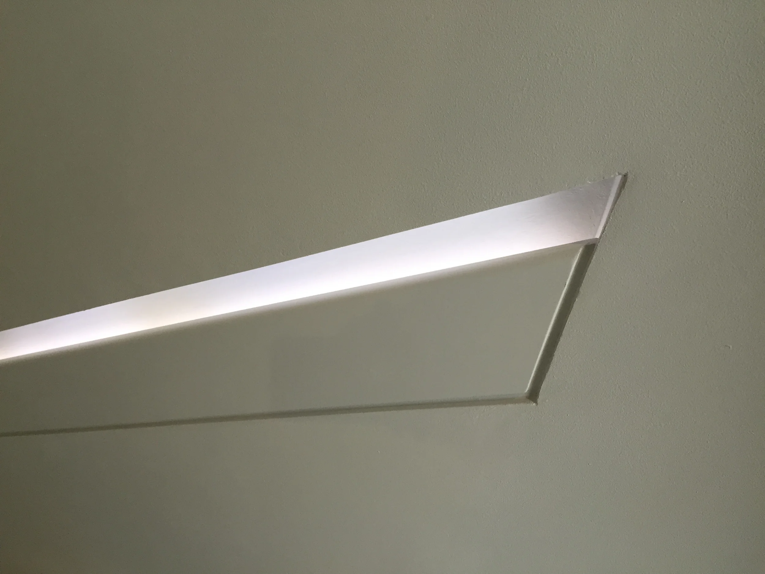 Concealed lighting within wall handle
