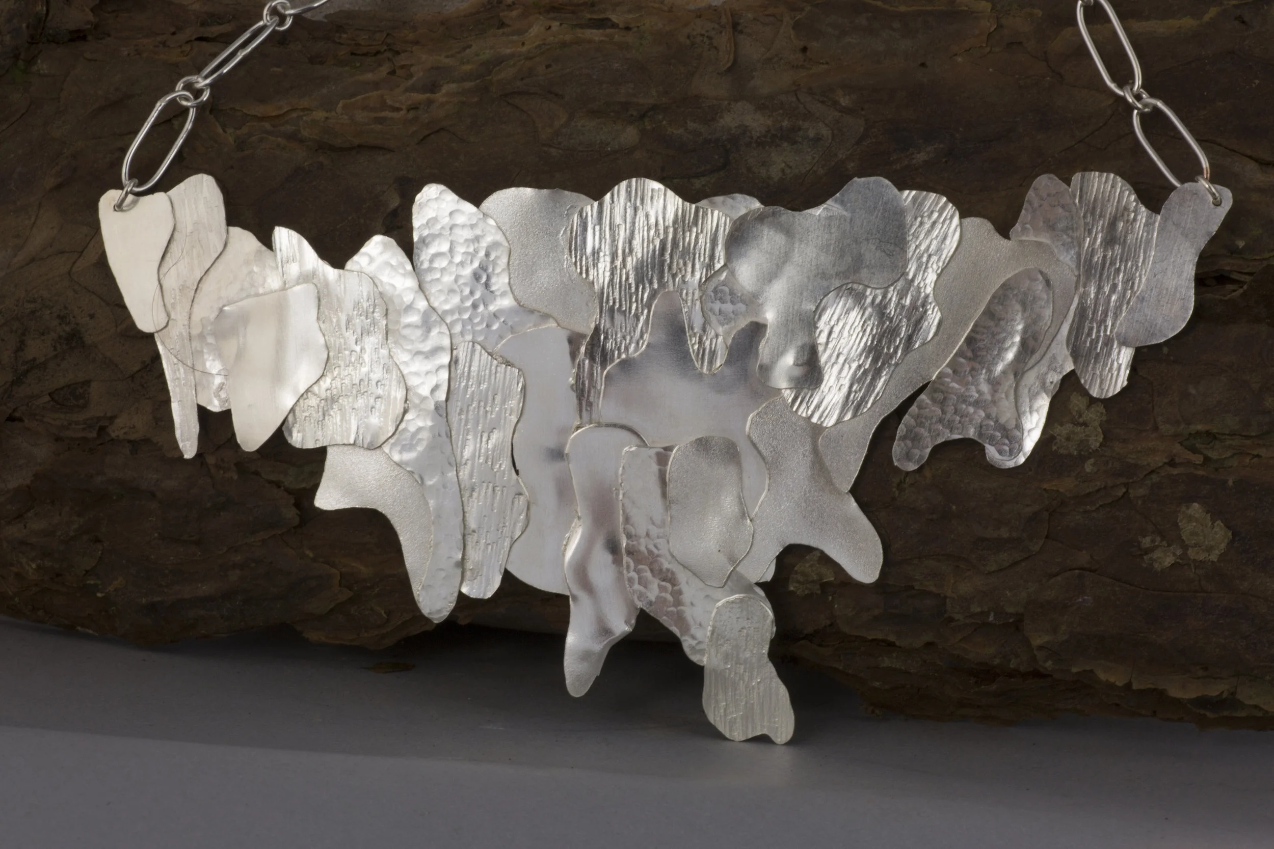 A statement neckline piece from the "Bark" Collection