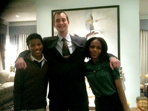 Photo: Anacostia students Lamar Penny and Nekaiya Wilson with foreign correspondent Eddie Walsh.