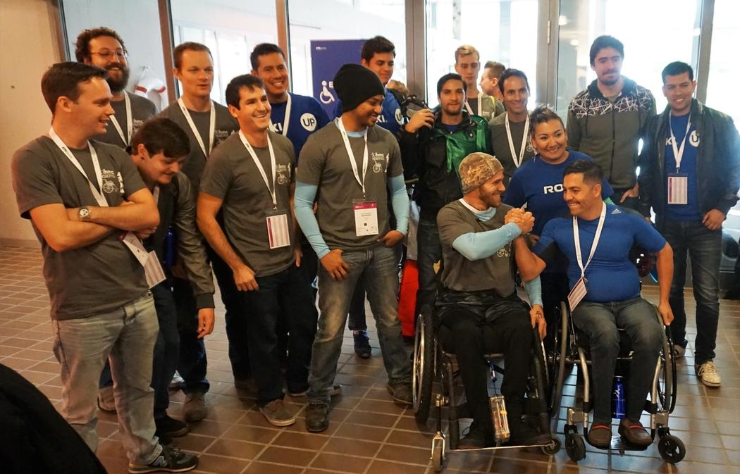 IHMC and Roki pose together the day before Cybathlon. Credit: Brian Blickenstaff