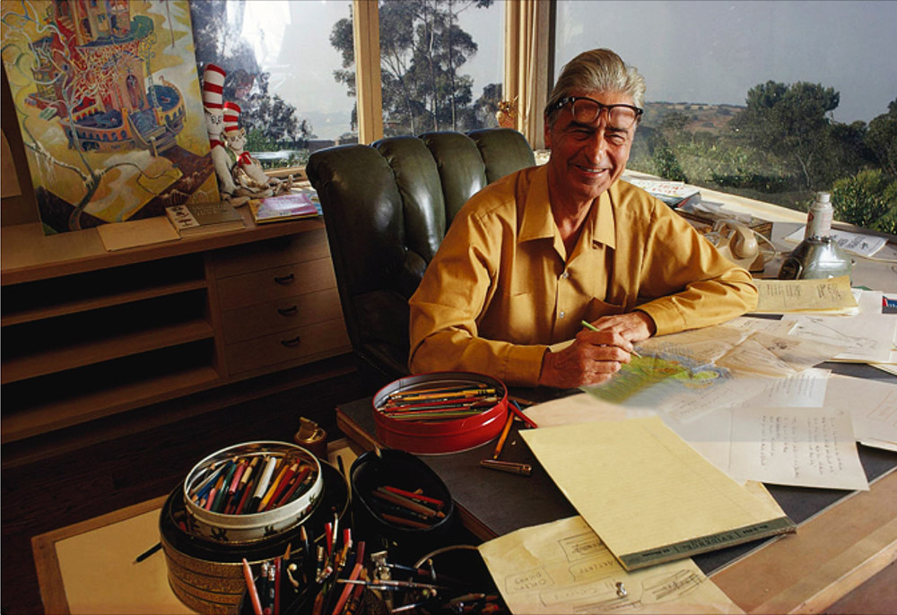 Each limited edition print will be accompanied by an 8" x 10" glossy photograph of the above 1969 photograph of Theodor Seuss Geisel at his drawing table with the original That Winter Spring Came Late. 
