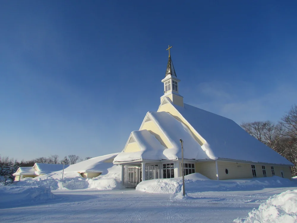 Range Apostolic Lutheran Church surrounded by deep snow in South Range, Michigan