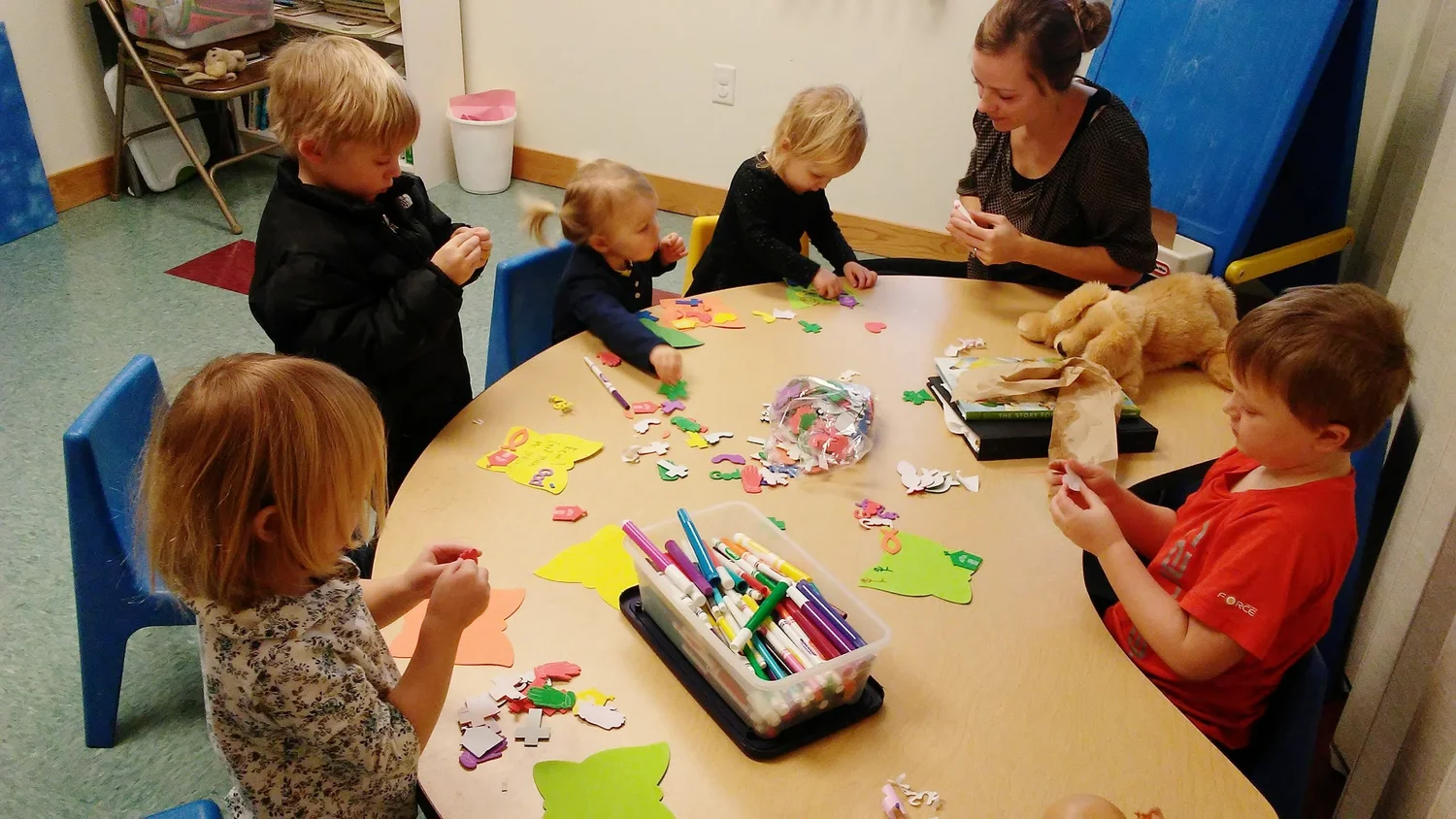 Children working on crafts at Sunday School