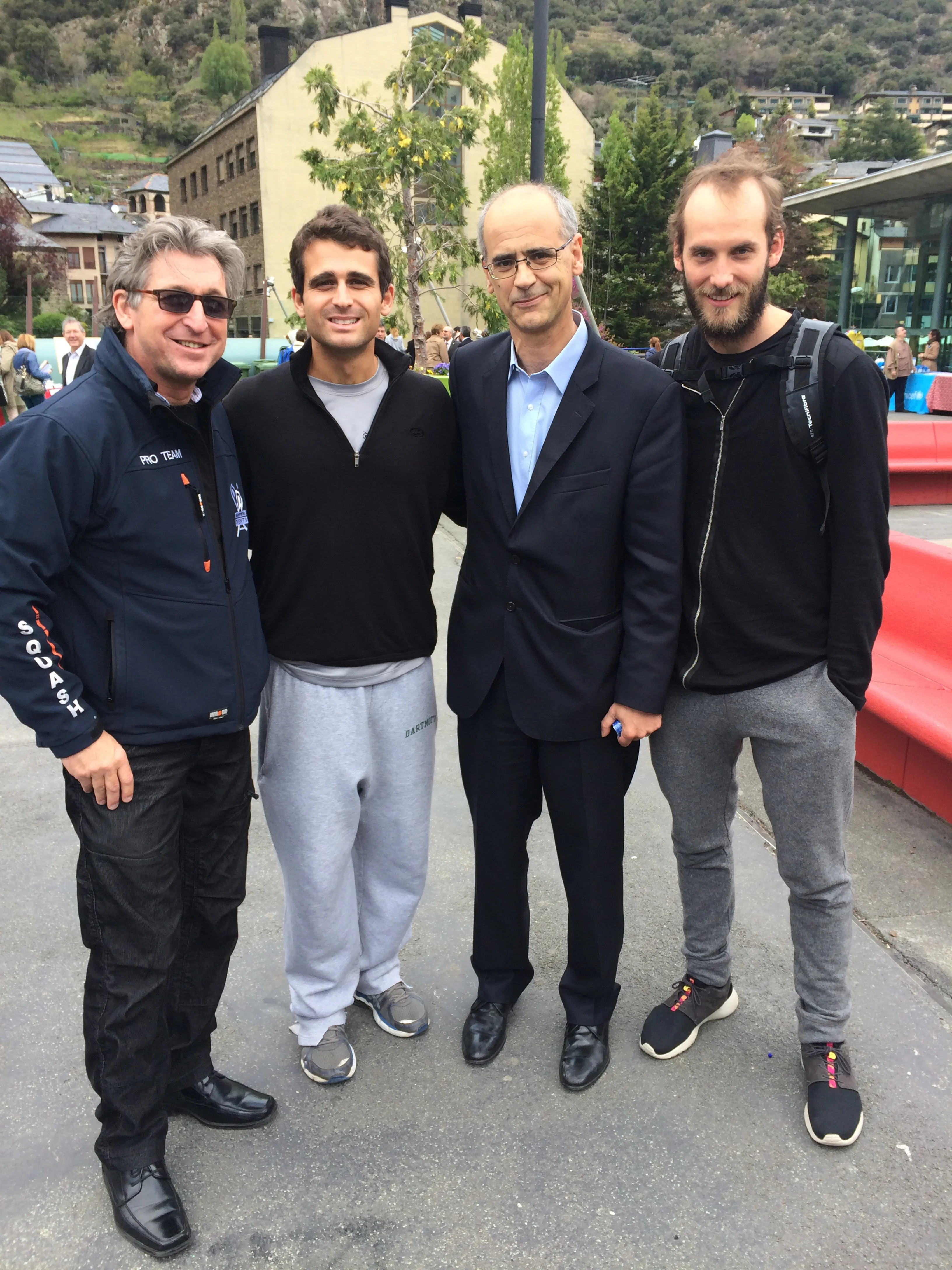 The President of Andorra (suit) with some random squash enthusiasts 