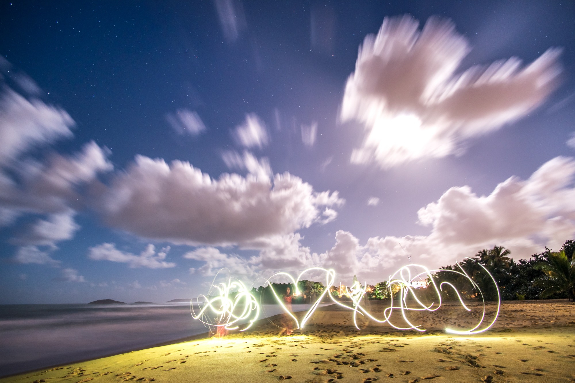 Last shot of the evening... Yifan (on the left) and Geoff (on the right) paint their everlasting love into the night, beneath the moon and stars of Arecibo, Puerto Rico.