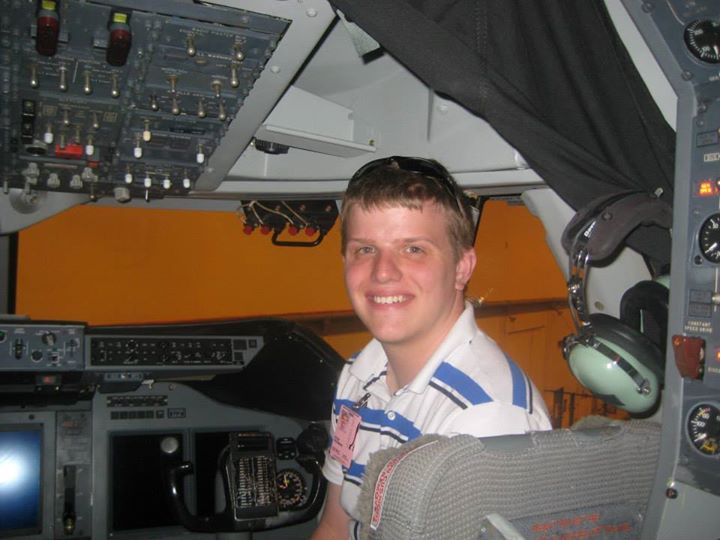 Sean posing in SOFIA, a NASA aircraft
