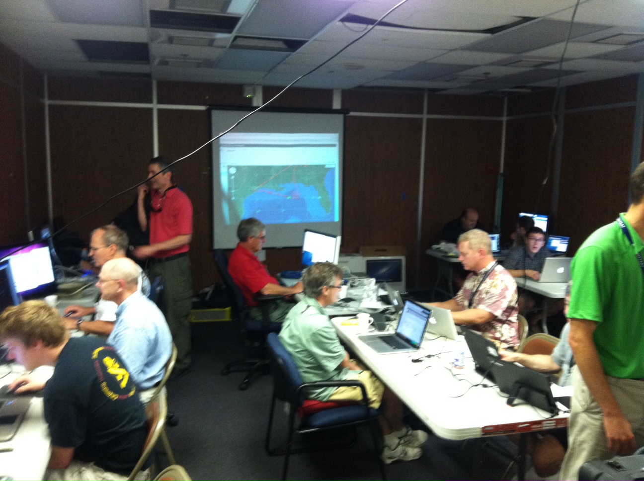 Sean (in his Phi Eta Sigma shirt; bottom right) working to give weather updates to airplanes in flight during SEAC4RS