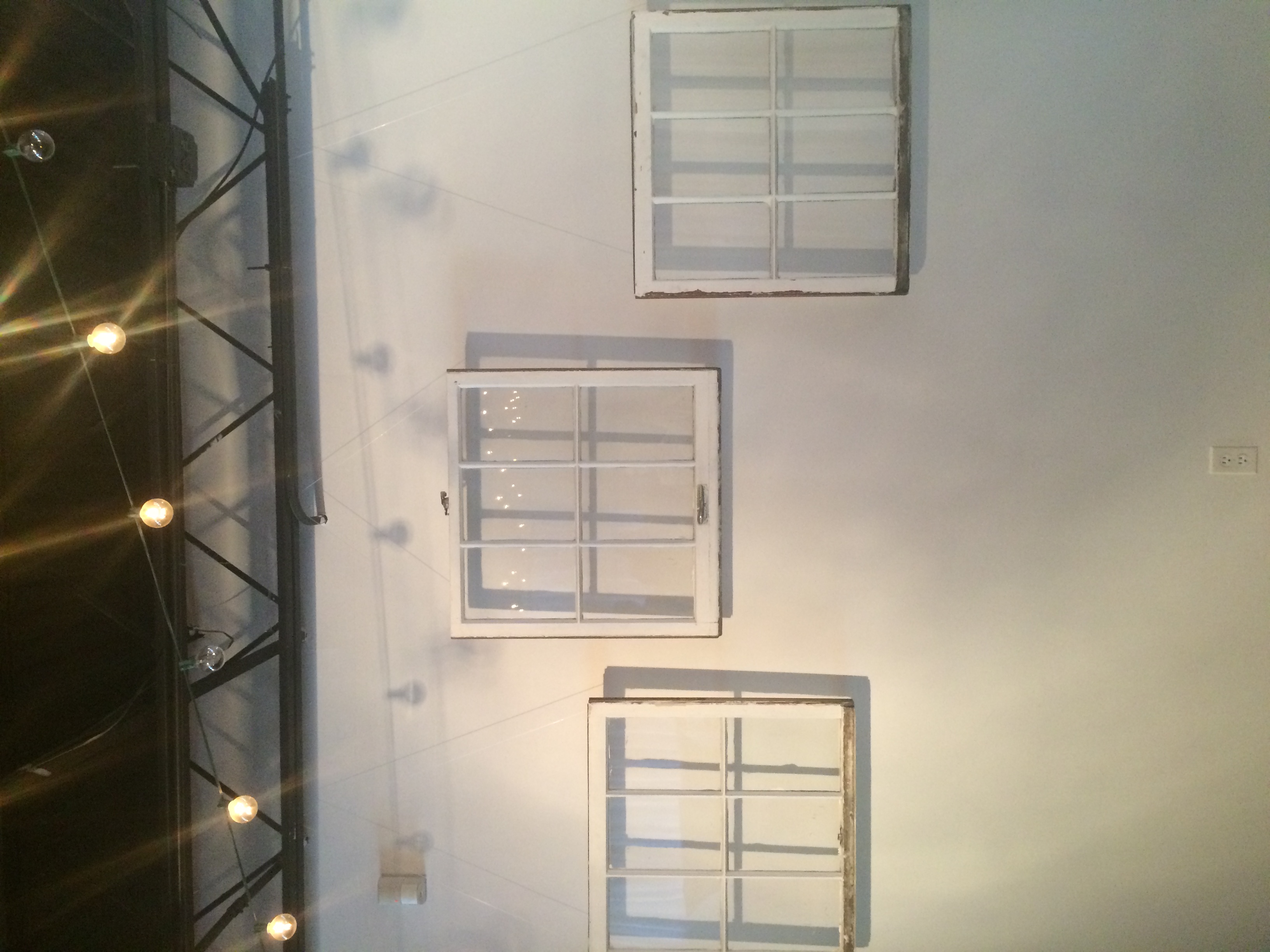 Antique windows that Jessica, the bride, collected herself. 