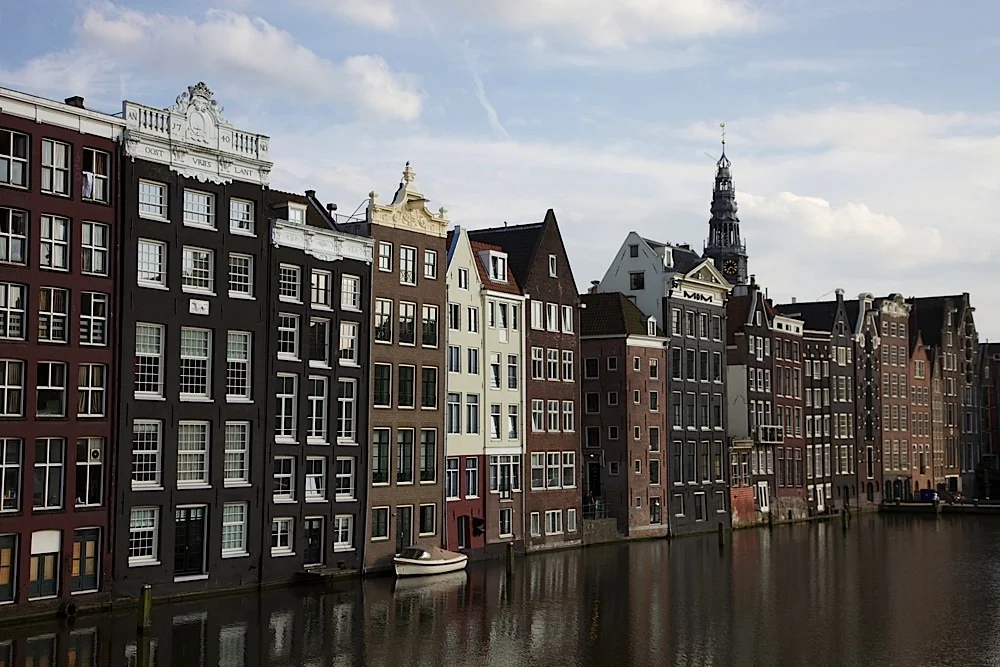 Pretty homes/businesses along a canal in Amsterdam, The Netherlands.