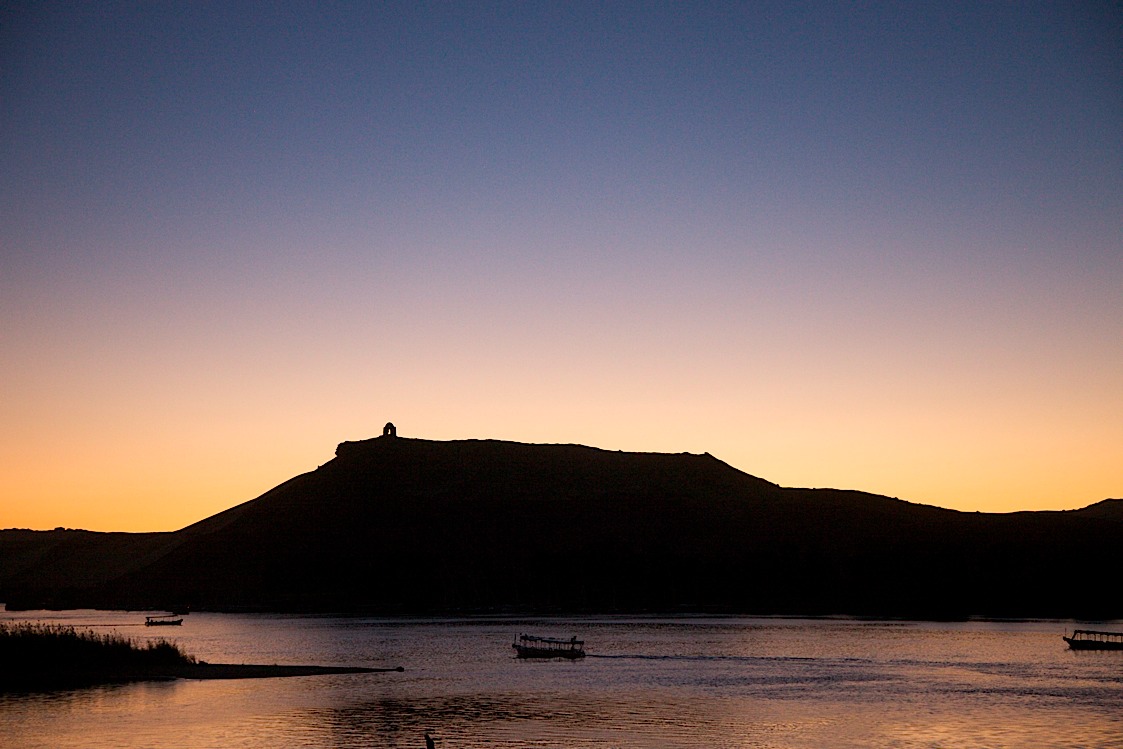 Sunset over the mausoleum of Aga Khan at Aswan. (Viewed from the boat.)