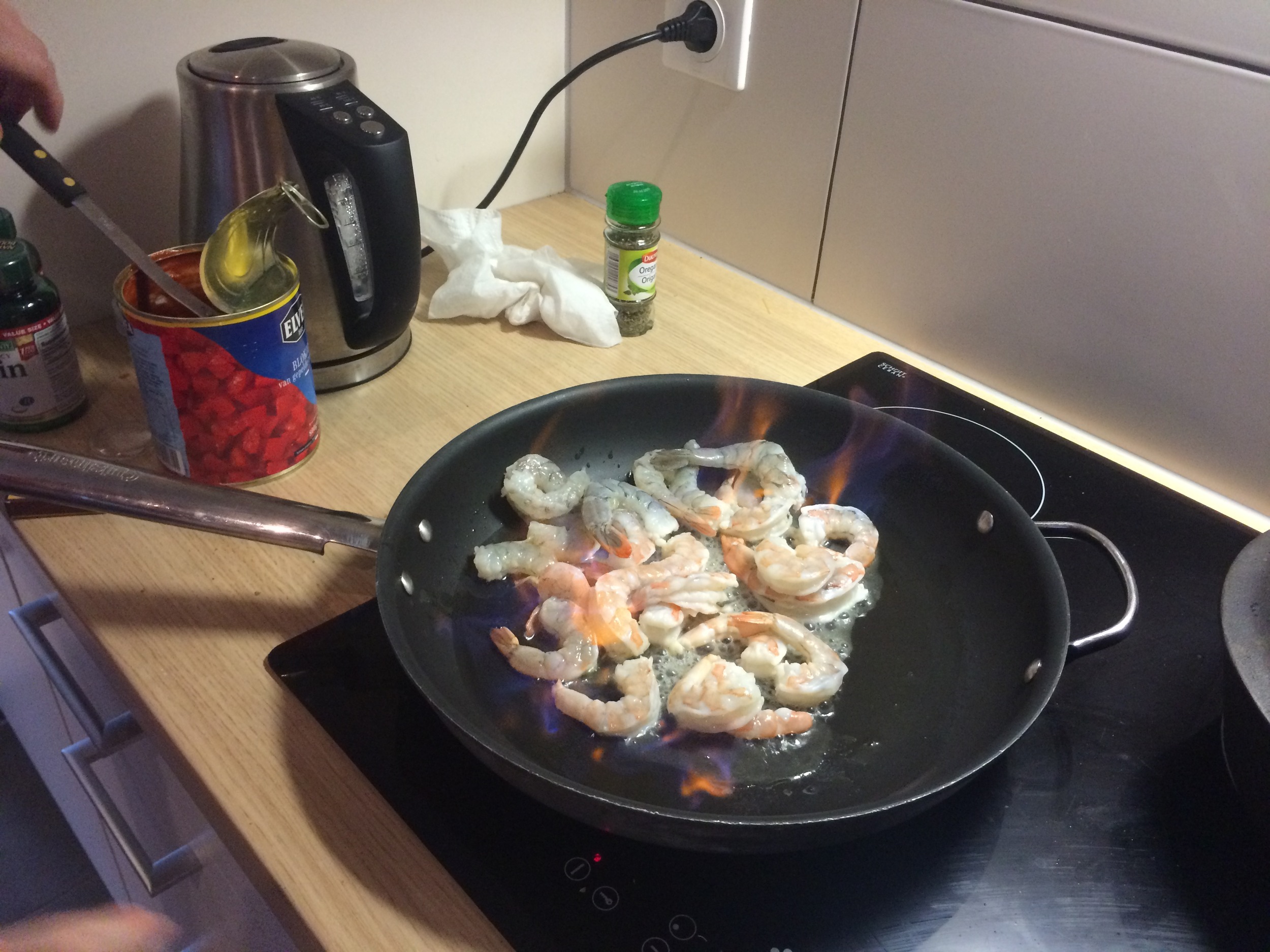 Noelle teaching me to cook a shrimp/feta dish at her and her husband's new apartment. (Brussels, Belgium.)