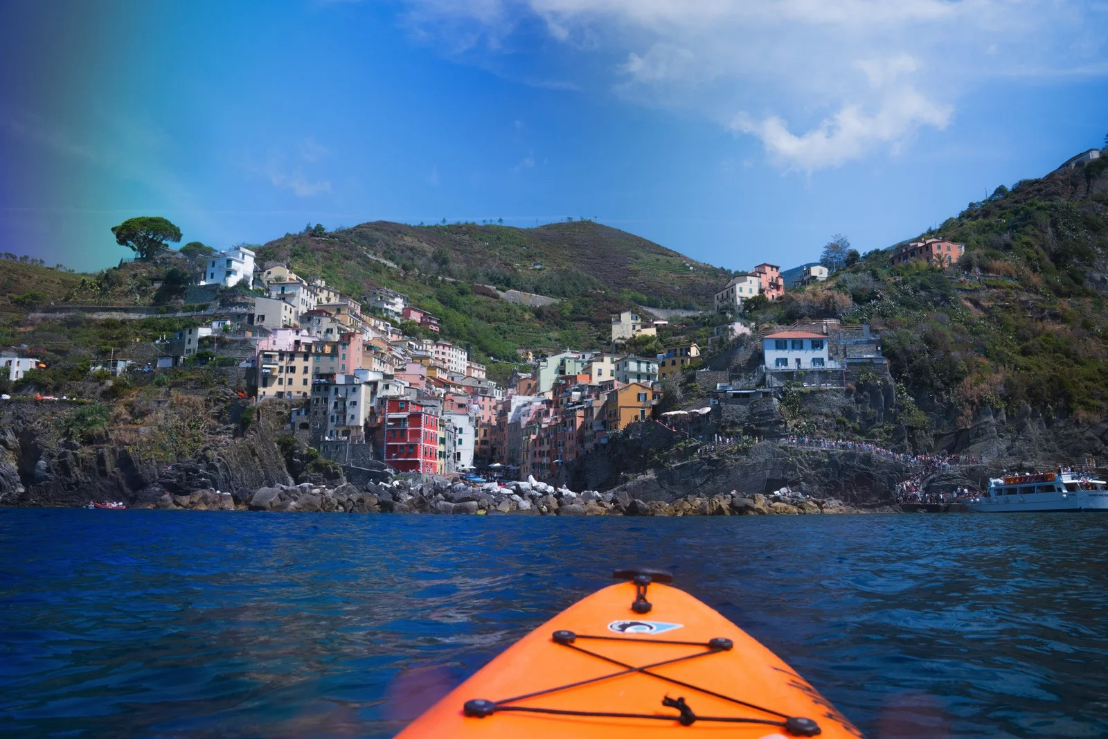 Riomaggiore from my kayak. (Riomaggiore, Liguria, Italy.)