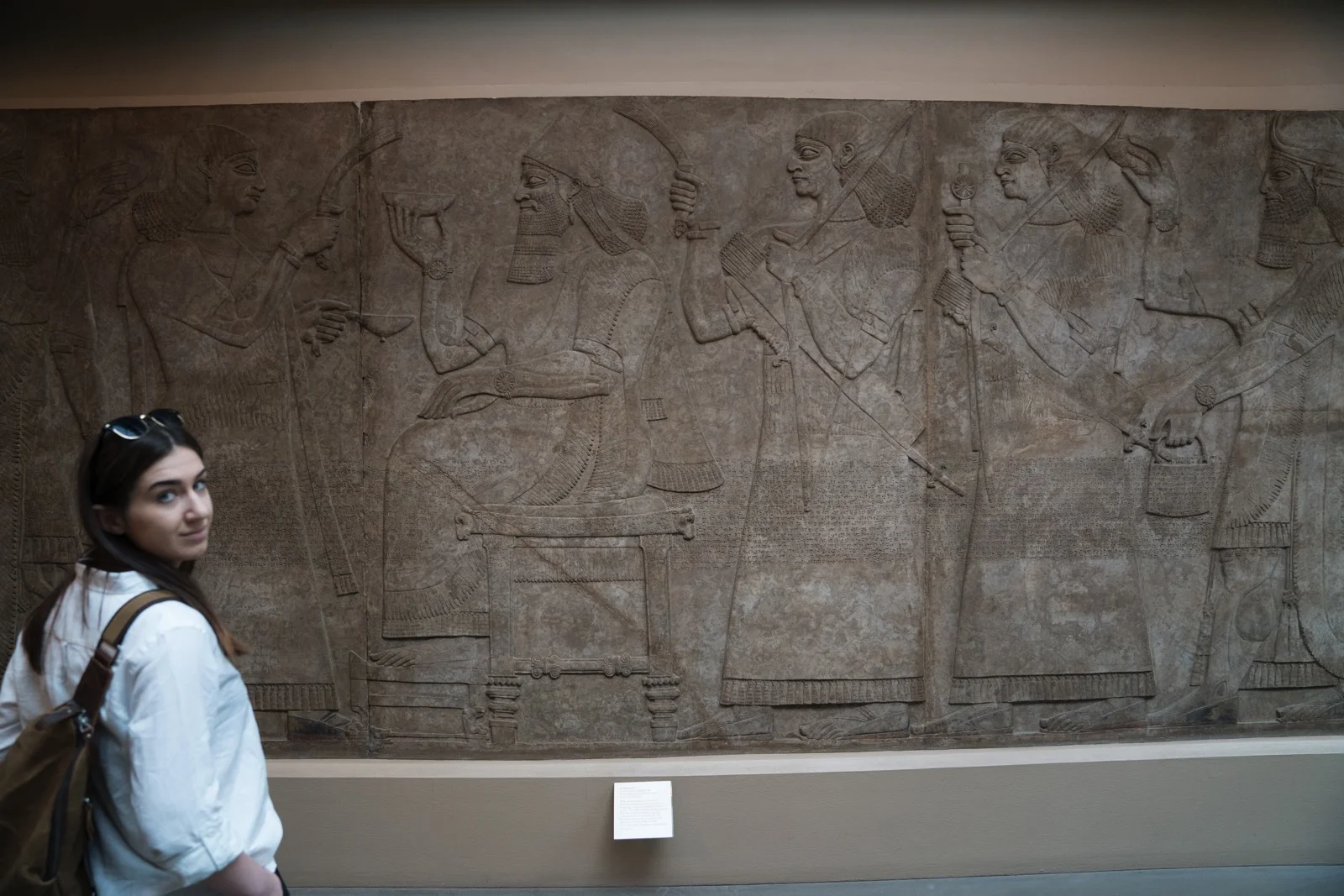 Sarah in front of a Hittite frieze at the British Museum. (London, United Kingdom.)