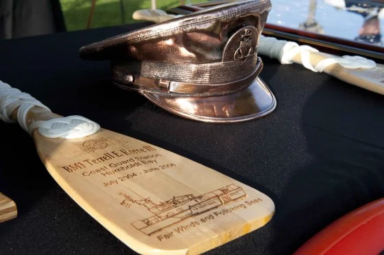 Memorabilia showcased at a memorial service for Senior Chief Petty Officer Terrell Horne III. U.S. Coast Guard photo by Petty Officer 1st Class Timothy Tamargo.