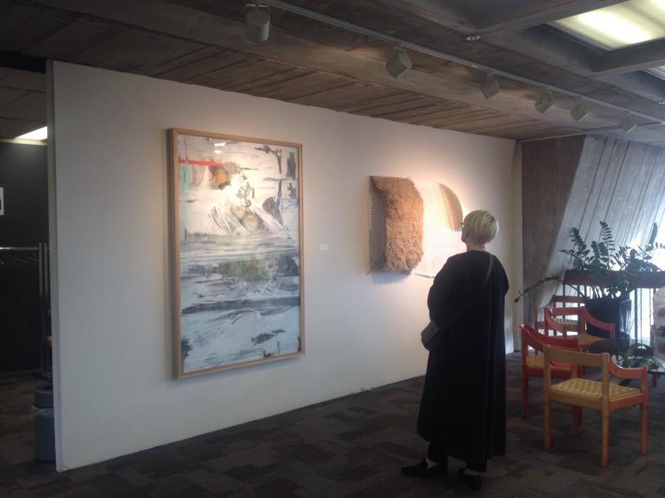 Fashion Designer Andrea Reynders taking in my work and Rita's