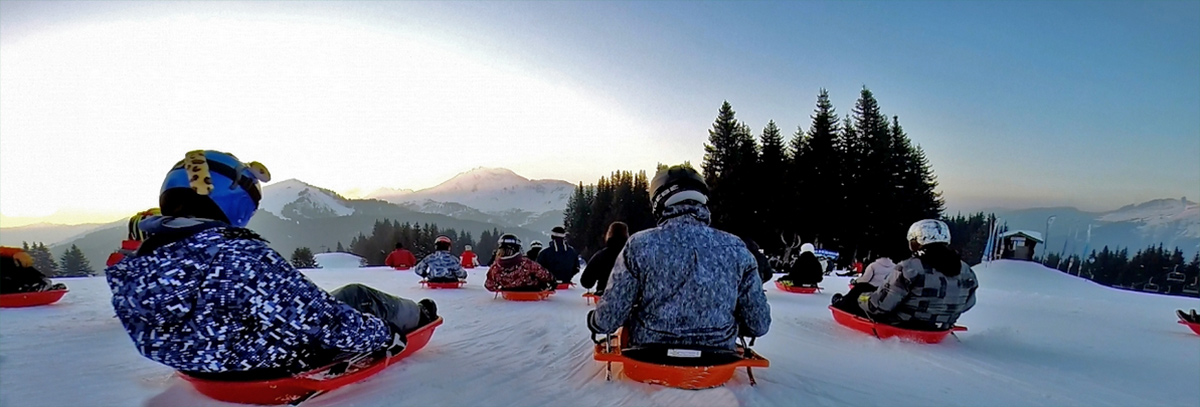 Races your friends down the slopes while skiers enjoy their apres ski. Image courtesy of Morzine.