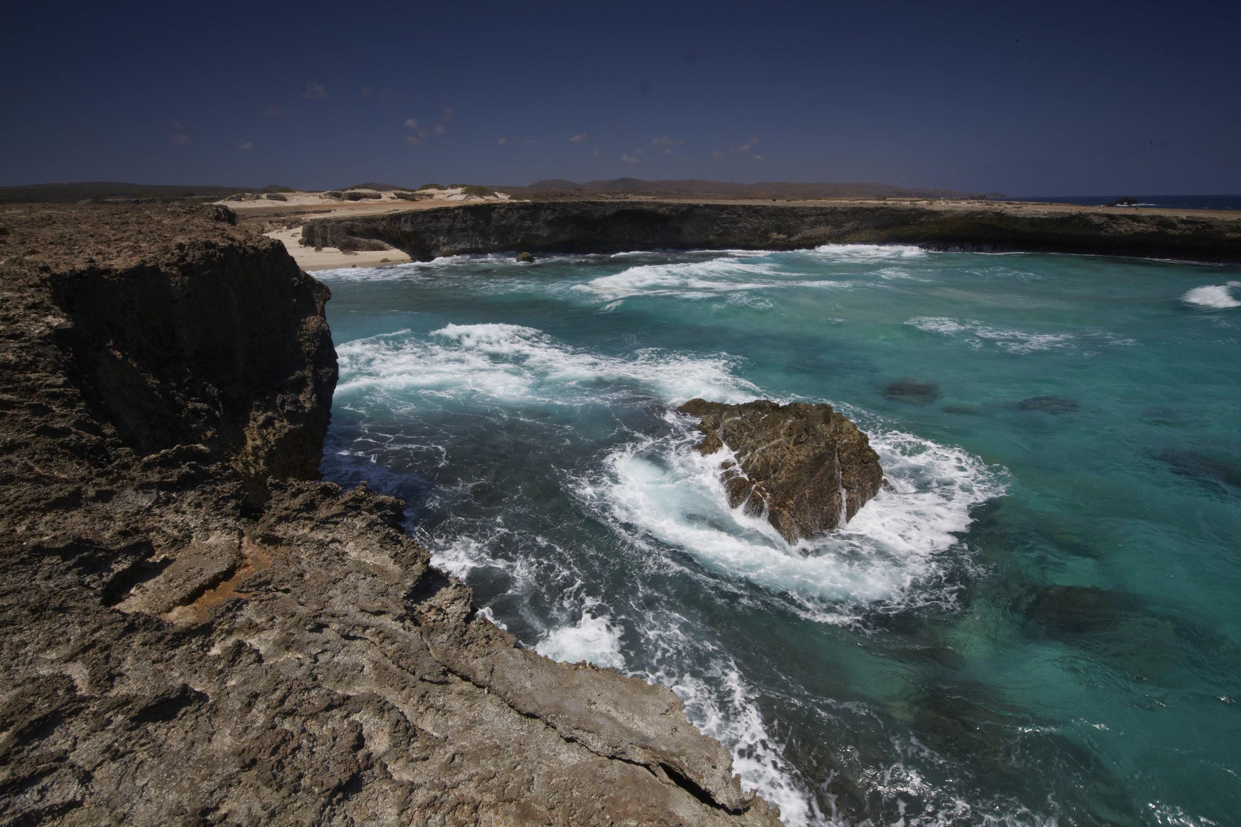 The rocky shoreline of Arikok National Park. Image courtesy of the Aruba Tourism Authority .