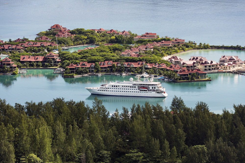 Crystal Esprit, outside of Eden Island in the Seychelles. Image courtesy of Crystal Cruises .