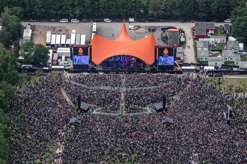  An aerial shot of Roskilde's famous Orange Stage. Image courtesy of Roskilde Festival and Phlake. 