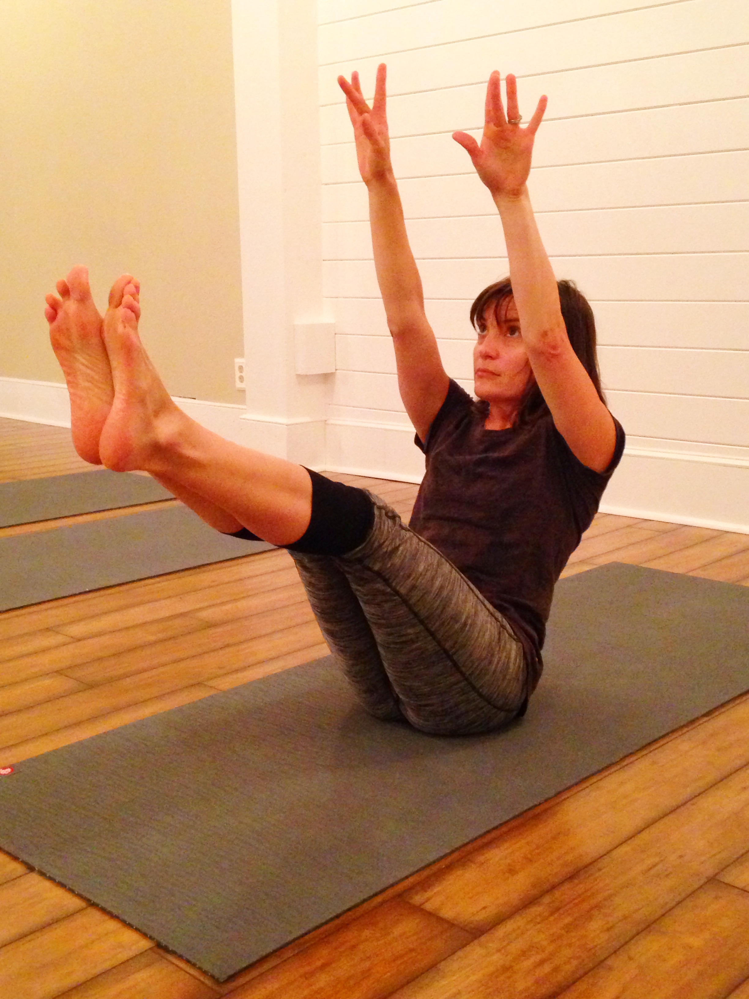 Morgan demonstrating the Pilates Teaser 
