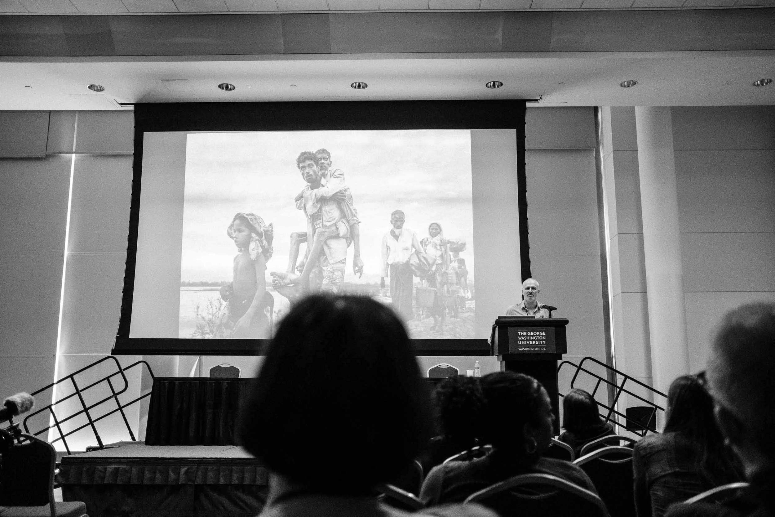Patrick Brown discussing his project “No Place on Earth,” documenting the plight of the Rohingya.