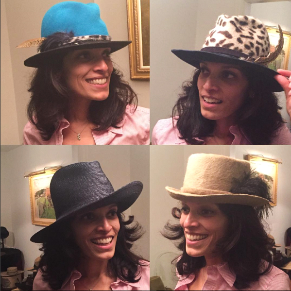 Neha modeling four hats!