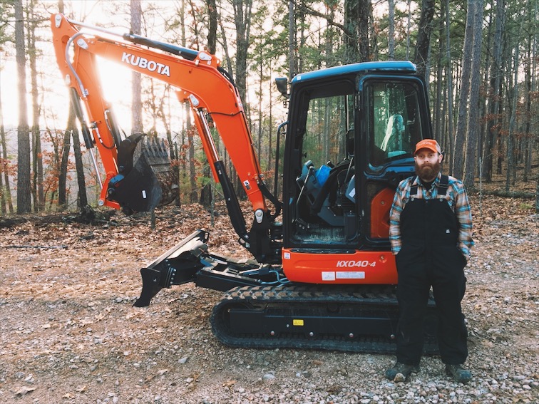  A man and his machine. The excavator has never looked as clean as it did this day. 