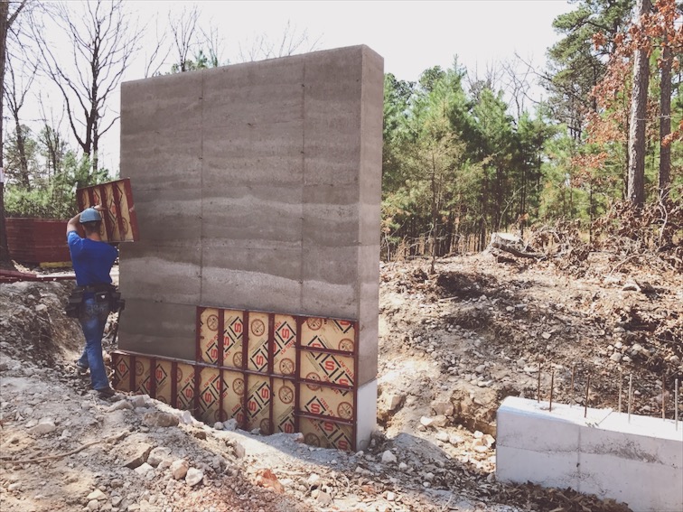  Stripping forms. The layers and texture are what I love about rammed earth. It's as real a material as you can get.&nbsp; 