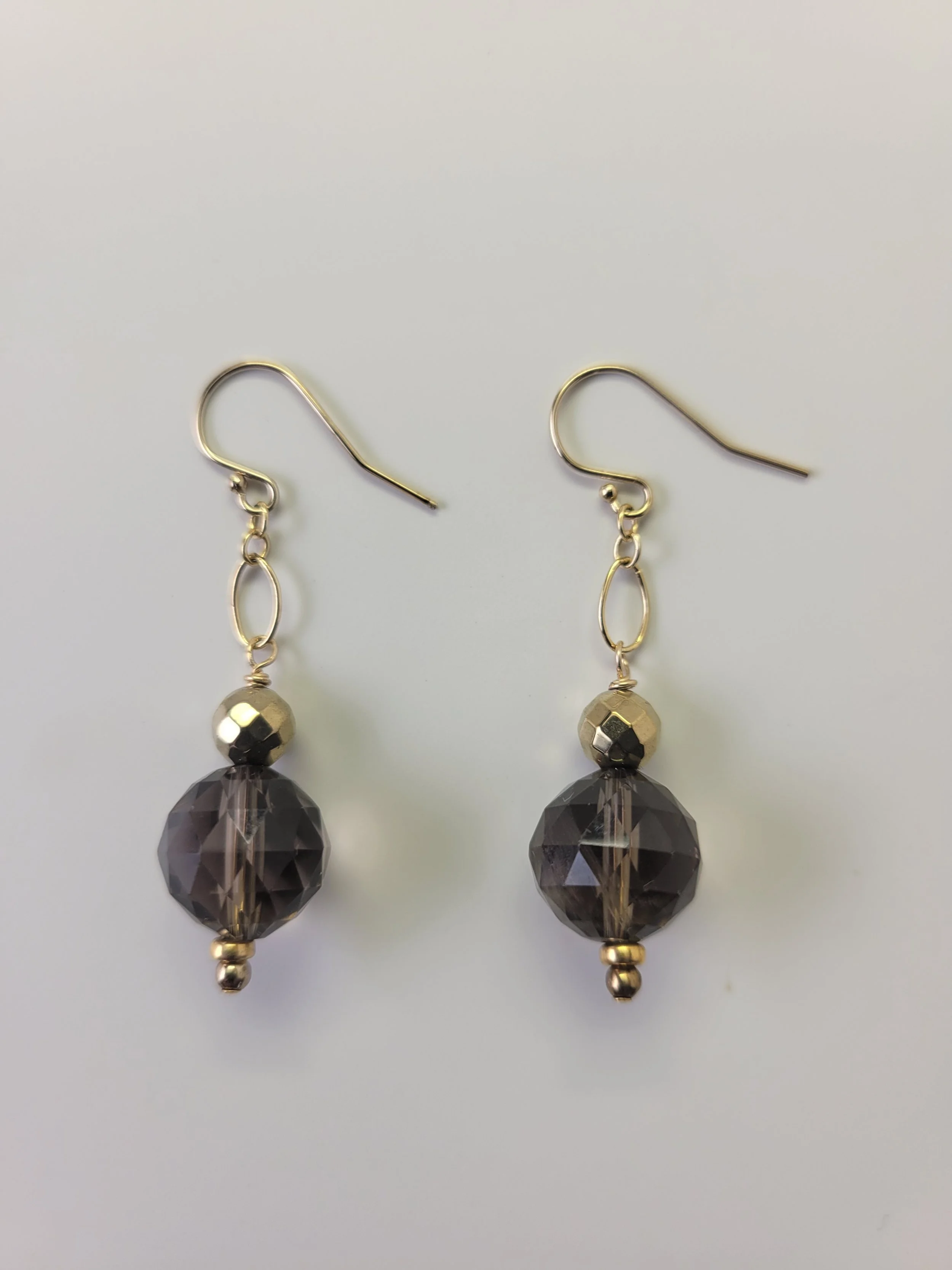 Smoky quartz dangles with faceted hematite.jpg