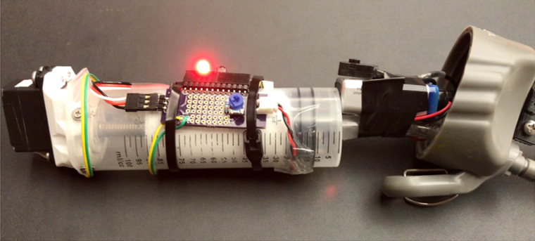 The SeaGlide "buoyancy engine" is made up of a syringe, whose plunger is actuated by a servo to take in and expel water.