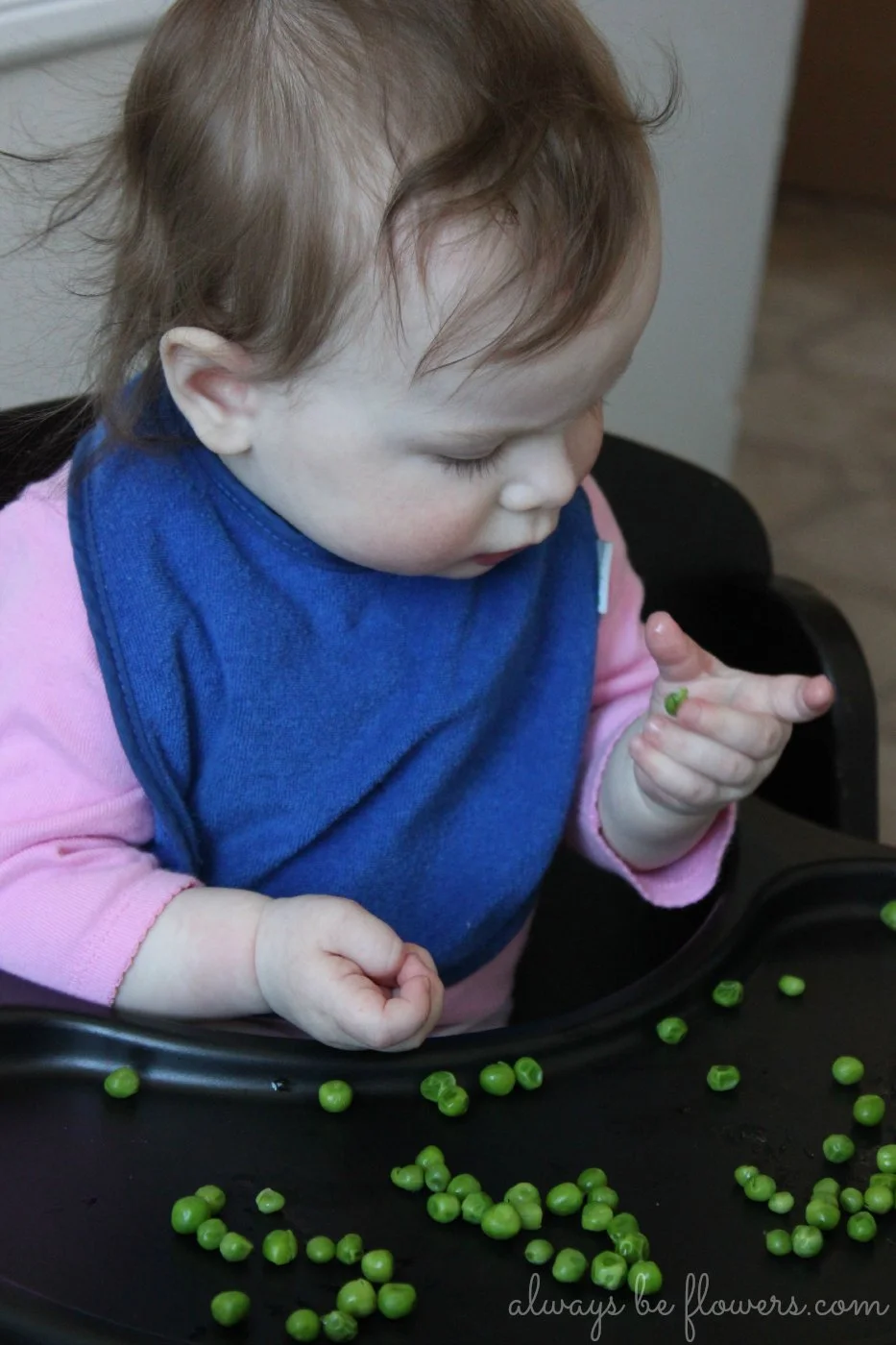 Picking up peas helps develop fine motor skills.