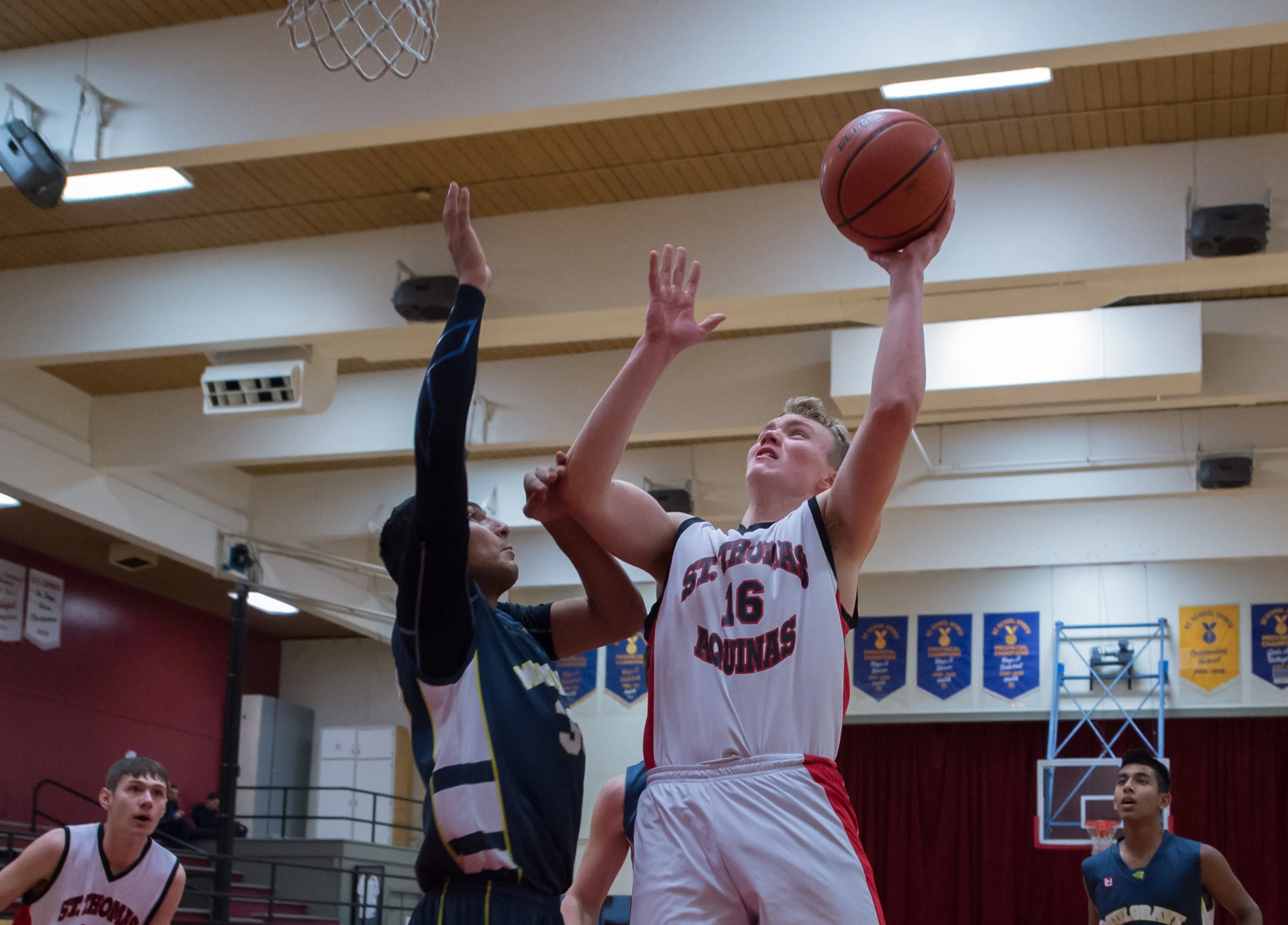 STA's Erik Dahl attacks the hoop early in the first quarter of the STA /Mulgrave game which STA went on to win 95-58. STAwill now face Collingwood in the 2018 AA Howe Sound Championships