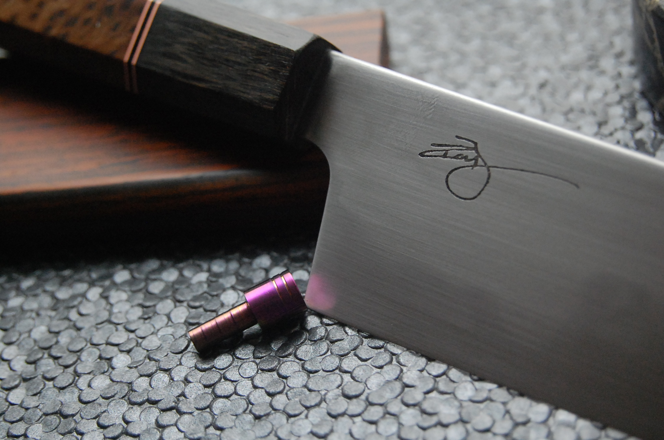 The keeper pin is anodized titanium.