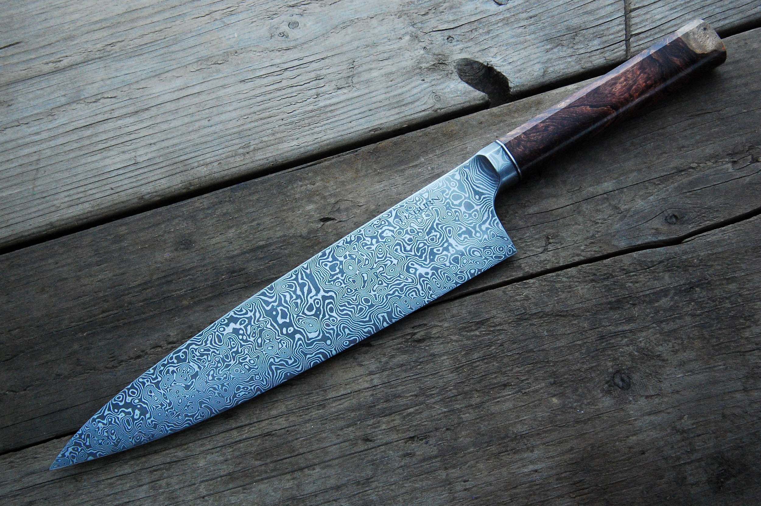 The first gyuto is a hand forged damascus integral handled in rosewood burl. This gyuto is one of a kind. Available 14 October.
